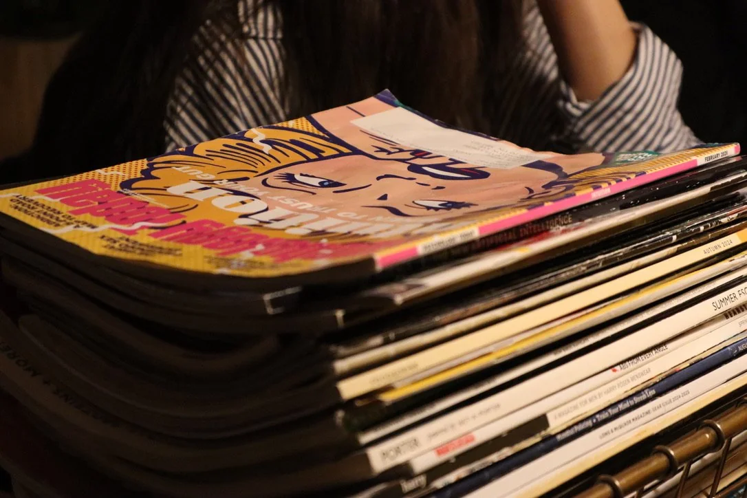 A stack of handmade scrapbooks